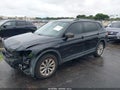 2018 Volkswagen Tiguan — photo 2 of 17 | VIN 3VV1B7AX8JM121605