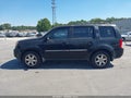 2010 Honda Pilot — photo 14 of 16 | VIN 5FNYF4H92AB022113