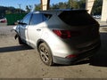 2014 Hyundai Santa Fe — photo 3 of 15 | VIN 5XYZT3LB2EG203440