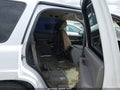 2004 Chevrolet Tahoe — photo 8 of 12 | VIN 1GNEC13Z94R119672