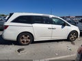 2012 Honda Odyssey — photo 13 of 16 | VIN 5FNRL5H97CB057929