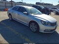 2016 Volkswagen Passat — photo 1 of 17 | VIN 1VWCS7A34GC028947