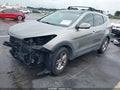 2017 Hyundai Santa Fe — photo 2 of 17 | VIN 5XYZU3LBXHG382473