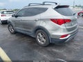 2017 Hyundai Santa Fe — photo 3 of 17 | VIN 5XYZU3LBXHG382473