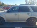 2009 Mercury Mariner — photo 14 of 16 | VIN 4M2CU81769KJ04676