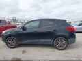 2014 Hyundai Tucson — photo 14 of 16 | VIN KM8JU3AG5EU875978