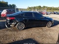 2019 Kia Optima — photo 13 of 16 | VIN 5XXGT4L39KG371307