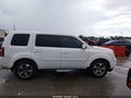 2014 Honda Pilot — photo 13 of 16 | VIN 5FNYF3H59EB011669