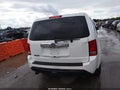 2014 Honda Pilot — photo 16 of 16 | VIN 5FNYF3H59EB011669