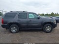 2011 Chevrolet Tahoe — photo 13 of 16 | VIN 1GNSKAE07BR116187