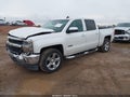 2018 Chevrolet Silverado 1500 — photo 2 of 16 | VIN 3GCUKREC6JG282001