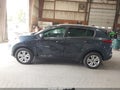 2019 Kia Sportage — photo 14 of 16 | VIN KNDPMCAC2K7590516