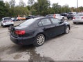 2015 Volkswagen Jetta — photo 4 of 11 | VIN 3VWD17AJ1FM300034