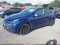 2024 Tesla Model Y — photo 2 of 19 | VIN 7SAYGDEE9RF129835