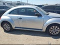 2014 Volkswagen Beetle — photo 13 of 16 | VIN 3VWFP7AT7EM629540
