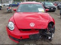 2012 Volkswagen Beetle — photo 13 of 17 | VIN 3VWJP7AT1CM661858
