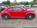 2012 Volkswagen Beetle — photo 14 of 17 | VIN 3VWJP7AT1CM661858