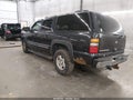2004 Chevrolet Suburban 1500 — photo 3 of 16 | VIN 1GNFK16T94J141622