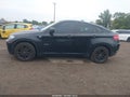 2013 BMW X6 — photo 14 of 16 | VIN 5UXFG2C57DL783989
