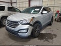 2013 Hyundai Santa Fe — photo 2 of 12 | VIN 5XYZUDLB5DG057956