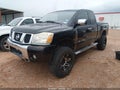 2006 Nissan Titan — photo 2 of 11 | VIN 1N6BA06B36N561350