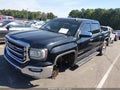 2016 GMC Sierra 1500 — photo 2 of 17 | VIN 3GTU2NEC0GG359804
