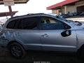 2011 Hyundai Santa Fe — photo 12 of 15 | VIN 5XYZG3AB7BG047947