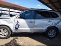 2011 Hyundai Santa Fe — photo 13 of 15 | VIN 5XYZG3AB7BG047947