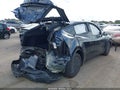 2026 Tesla Model Y — photo 4 of 15 | VIN 7SAYGDED2TA701923