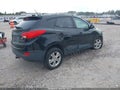 2013 Hyundai Tucson — photo 4 of 17 | VIN KM8JU3AC3DU703590