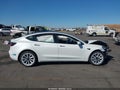 2022 Tesla Model 3 — photo 12 of 18 | VIN 5YJ3E1EB4NF347614