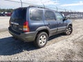 2003 Mazda Tribute — photo 4 of 16 | VIN 4F2CZ06103KM38383