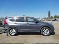2015 Honda CR-V — photo 14 of 21 | VIN 2HKRM3H70FH553435