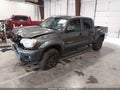 2015 Toyota Tacoma — photo 2 of 16 | VIN 5TFJU4GN7FX069768