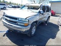 2004 Chevrolet Tahoe — photo 2 of 11 | VIN 1GNEK13T74R287759