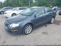 2010 Volkswagen Passat — photo 2 of 16 | VIN WVWJK7ANXAE129580