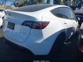 2024 Tesla Model Y — photo 4 of 20 | VIN 7SAYGAEE1RF183953