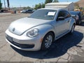 2014 Volkswagen Beetle — photo 2 of 11 | VIN 3VWF17AT1EM636467