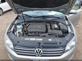2014 Volkswagen Passat — photo 10 of 12 | VIN 1VWAT7A34EC055048