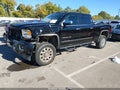 2016 GMC Sierra — photo 2 of 16 | VIN 1GT12UE84GF226442