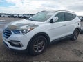 2018 Hyundai Santa Fe — photo 2 of 16 | VIN 5NMZU3LB5JH077877
