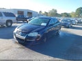 2009 Volkswagen Jetta — photo 2 of 12 | VIN 3VWRM71KX9M074201