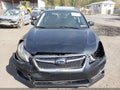 2015 Subaru Impreza — photo 12 of 16 | VIN JF1GJAA60FH023718