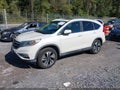 2015 Honda CR-V — photo 2 of 16 | VIN 5J6RM4H99FL004457