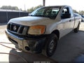 2008 Nissan Titan — photo 2 of 11 | VIN 1N6AA06E08N320161