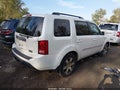 2014 Honda Pilot — photo 4 of 16 | VIN 5FNYF4H98EB022025