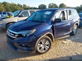 2018 Honda Pilot — photo 2 of 17 | VIN 5FNYF5H11JB031675