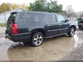 2012 Chevrolet Suburban 1500 — photo 4 of 18 | VIN 1GNSKKE70CR184416