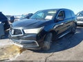 2017 Acura MDX — photo 2 of 16 | VIN 5FRYD3H39HB000596