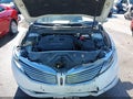2014 Lincoln MKZ — photo 10 of 15 | VIN 3LN6L2G92ER803753